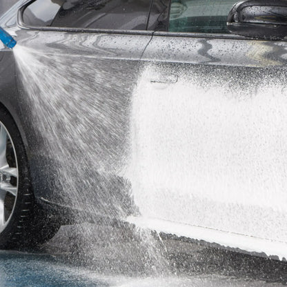 Car being washed with Advanced TFR by Autoglym spraying from a hose