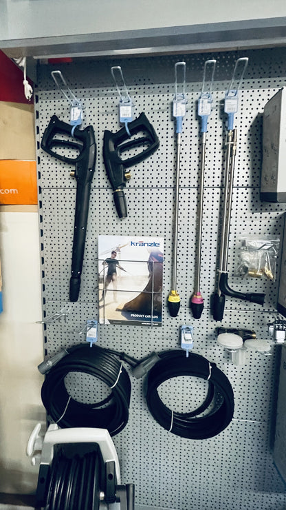 Pegboard with various tools and equipment on a shelf