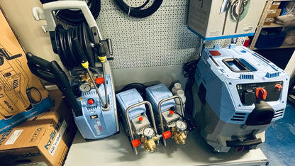 Workshop setting with tools and equipment on a pegboard