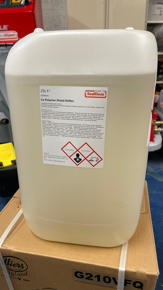 Large white container with a label on a cardboard box in an industrial setting