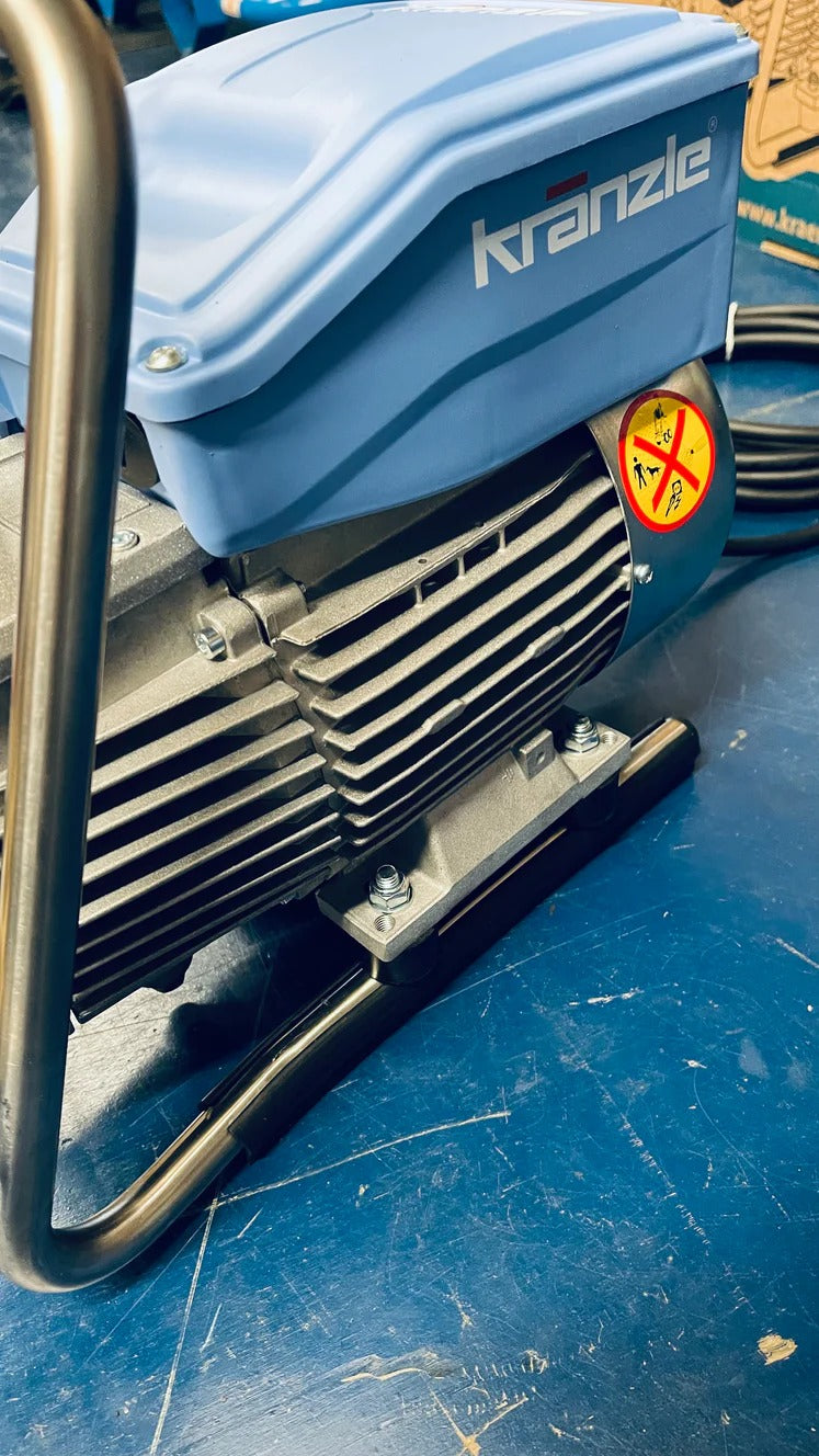 Blue air compressor with 'Kranzle' branding on a blue surface